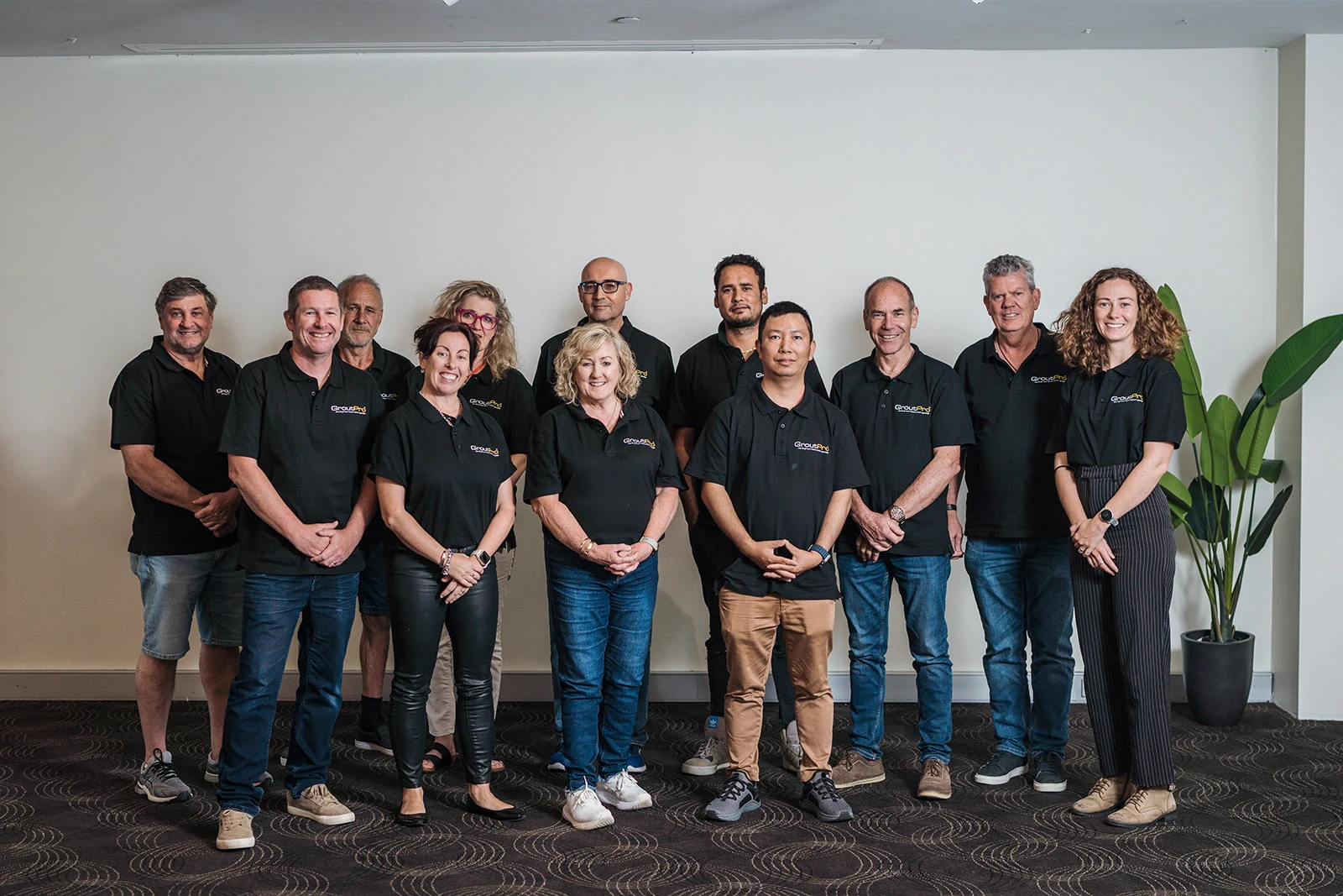 The GroutPro team gathers for a group photograph.